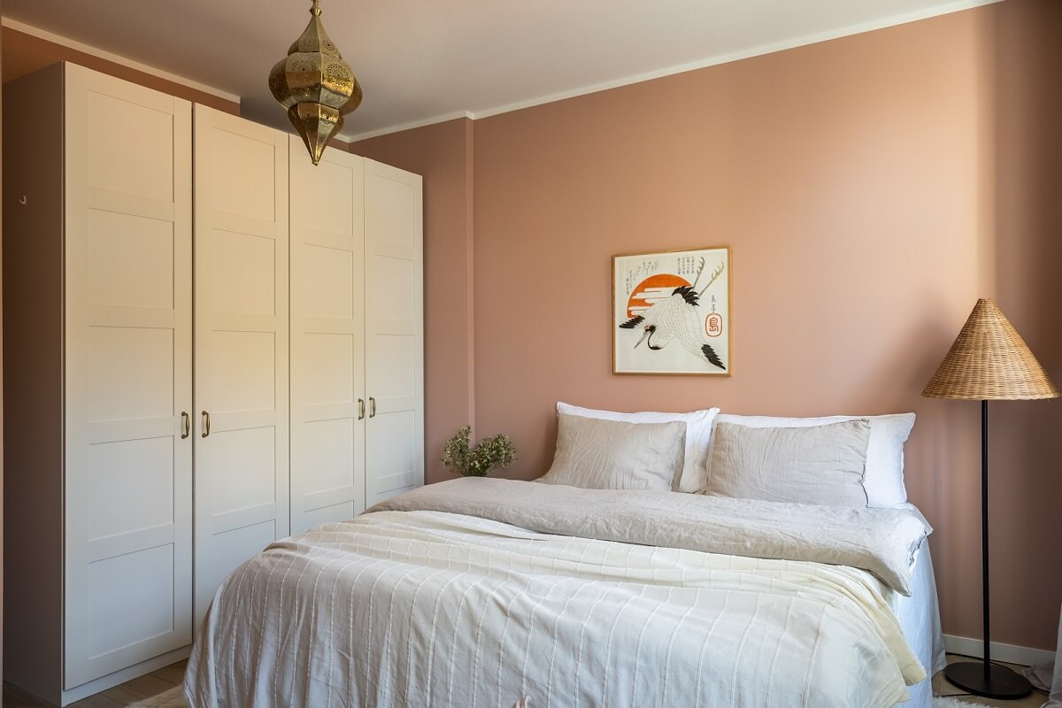 An Oslo Apartment with a Yellow Living Room 10 soft-pink-bedroom-walls-wardrobss-nordroom