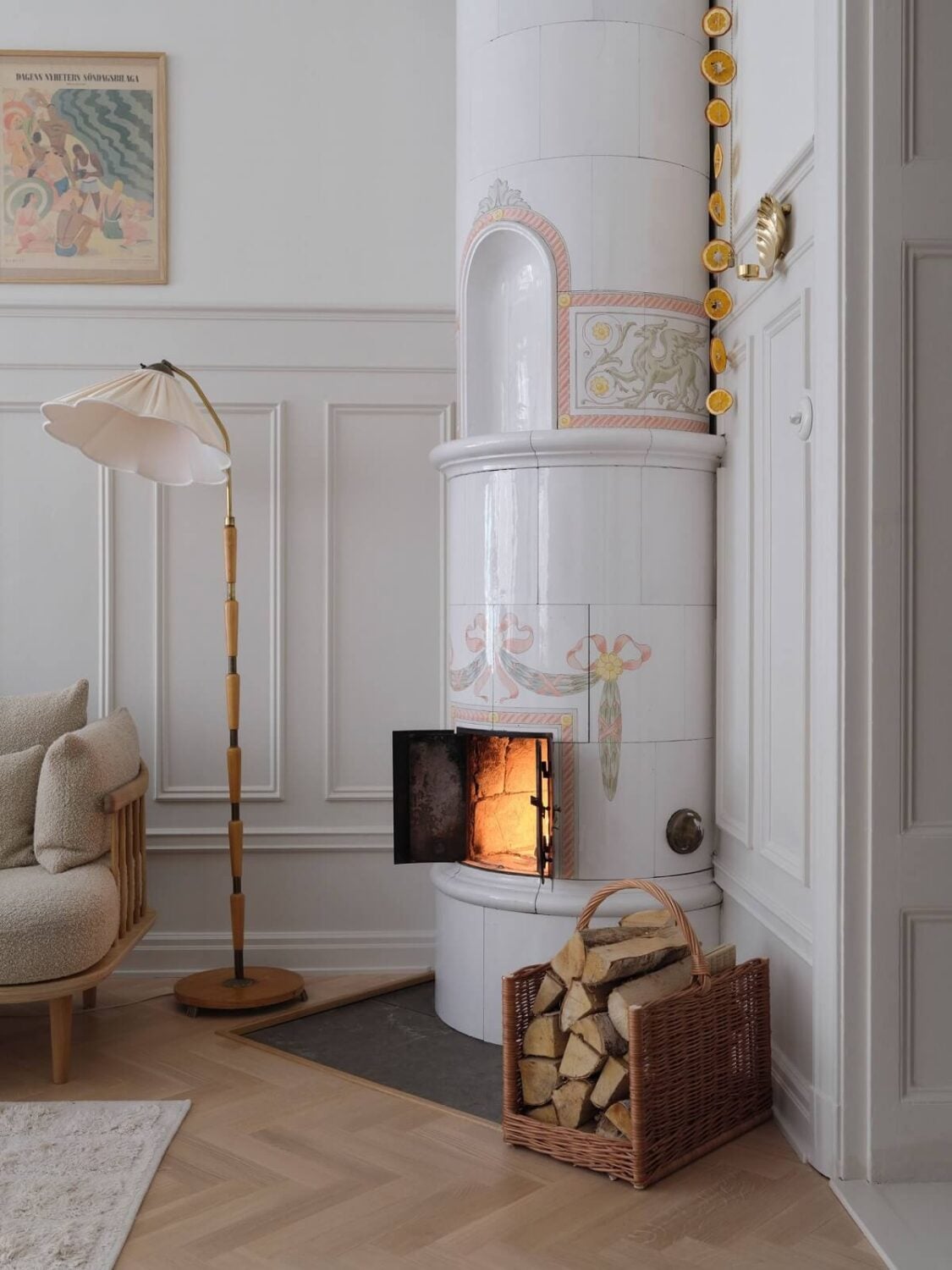 A Light Scandinavian Apartment with Classic Touches 6 swedish-fireplace-living-room-nordroom
