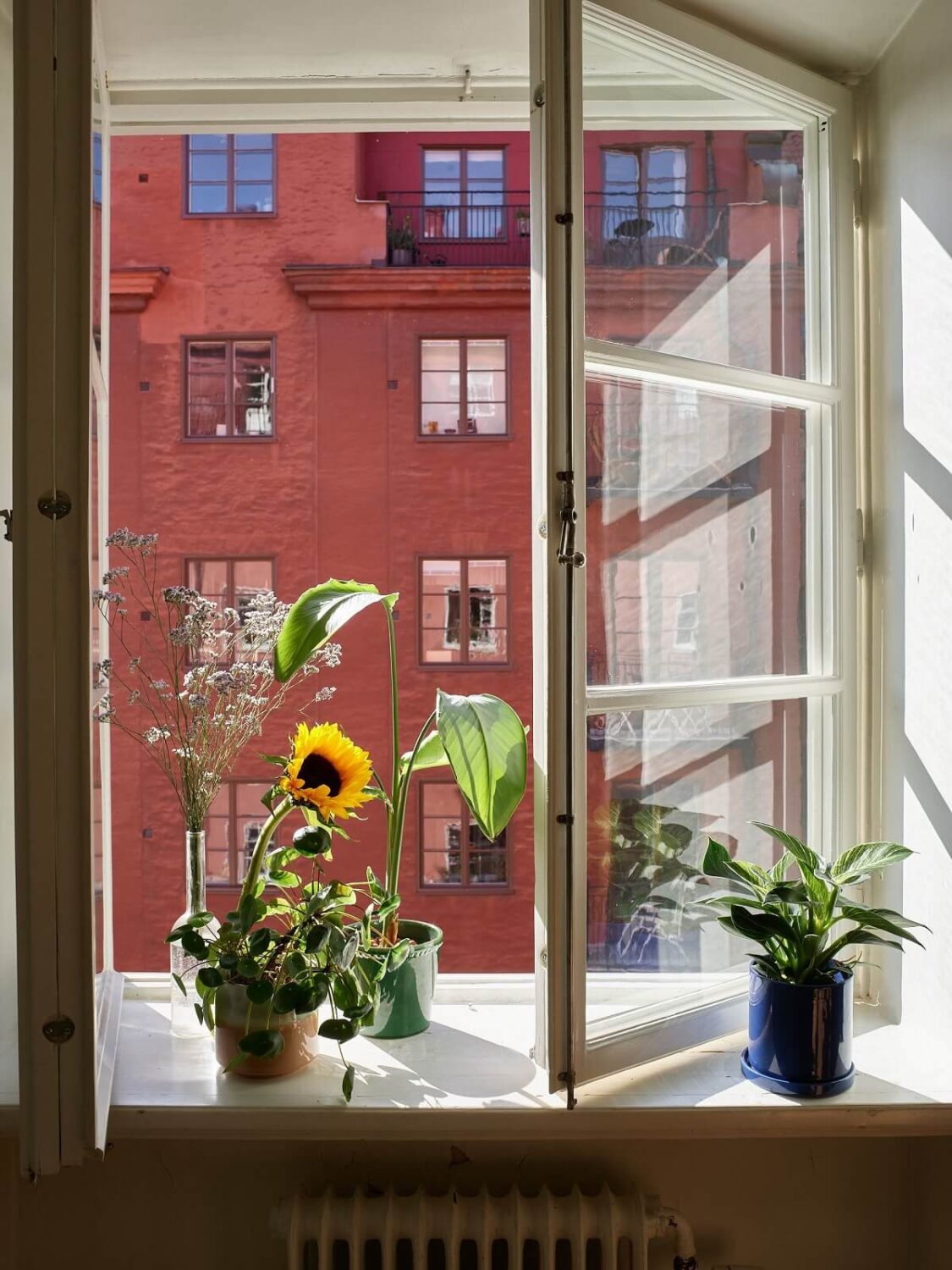 Pastel Colors in a Light Scandinavian Apartment 11 swedish-houses-view-window-nordroom