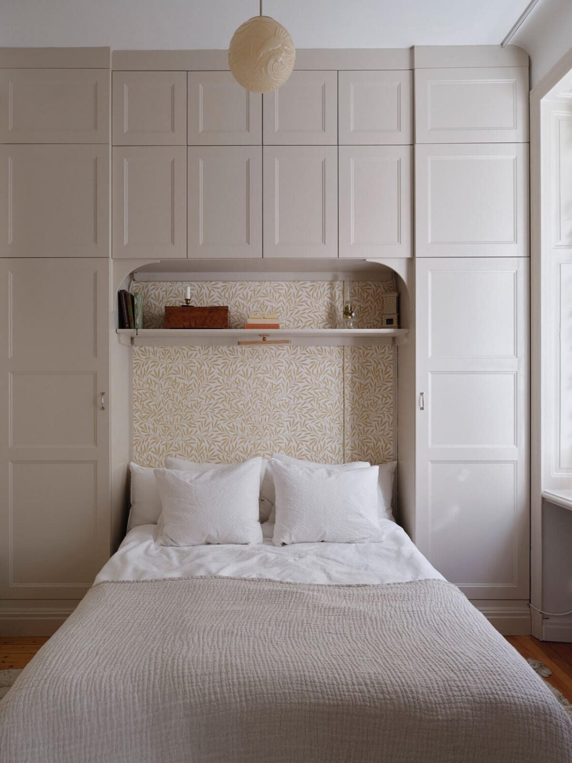 A Light Scandinavian Apartment with Classic Touches 11 tiny-light-bedroom-built-in-wardrobes