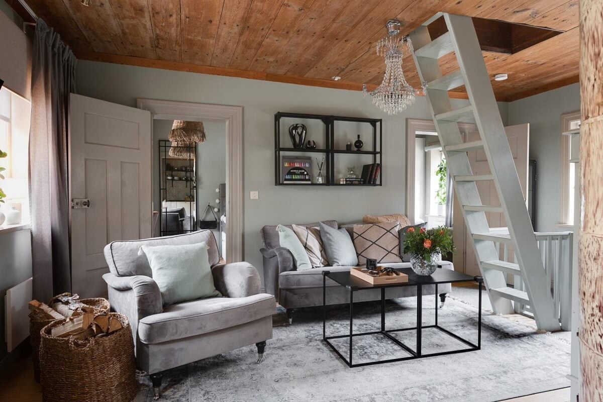 A Small 18th-Century Courtyard House in Sweden 2 tiny living room light gray wooden ceiling