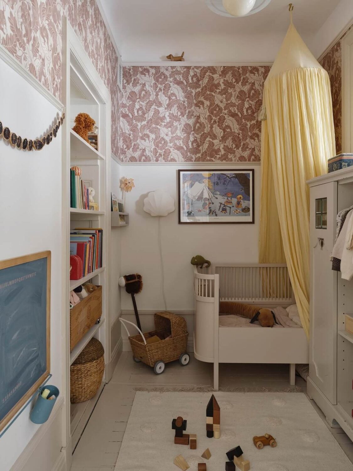 A Light Scandinavian Apartment with Classic Touches 16 tiny-nursery-wallpaper-nordroom