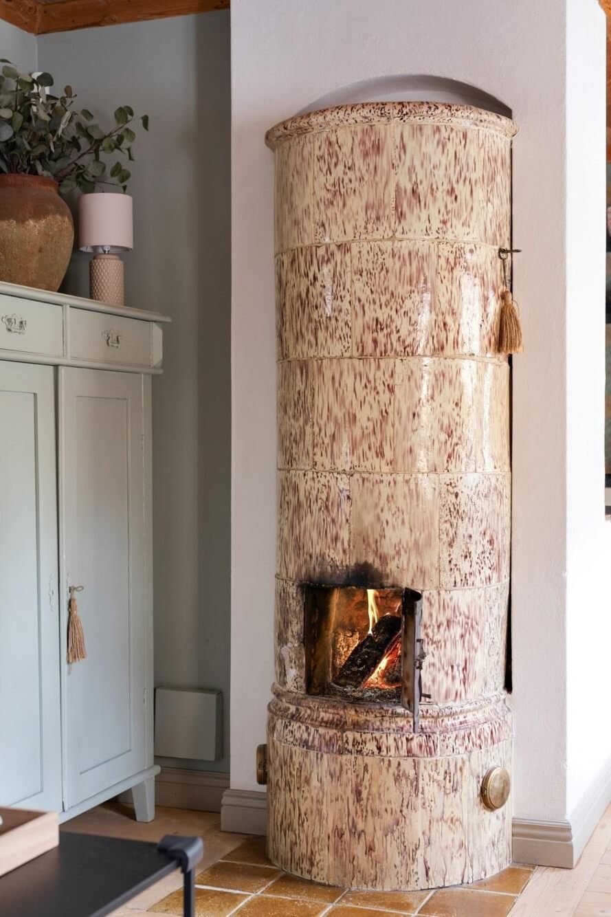 A Small 18th-Century Courtyard House in Sweden 6 traditional swedish fireplace