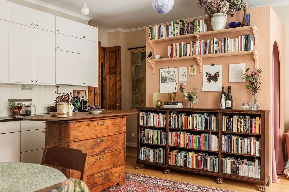 A Vintage Style Apartment in Stockholm 6 vintage-style-living-room-bookcases-wooden-kitchen-island-nordroom
