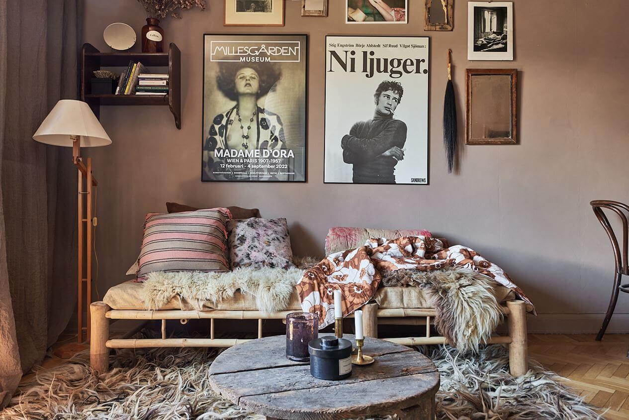 A Scandinavian Studio Apartment with Pink Walls 2 wooden-bench-sofa-gallery-wall-studio