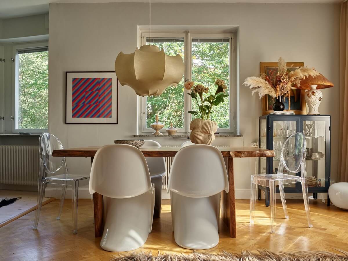 Warm Pink Tones in A Stockholm Apartment 6 wooden-dining-table-scandi-living-room