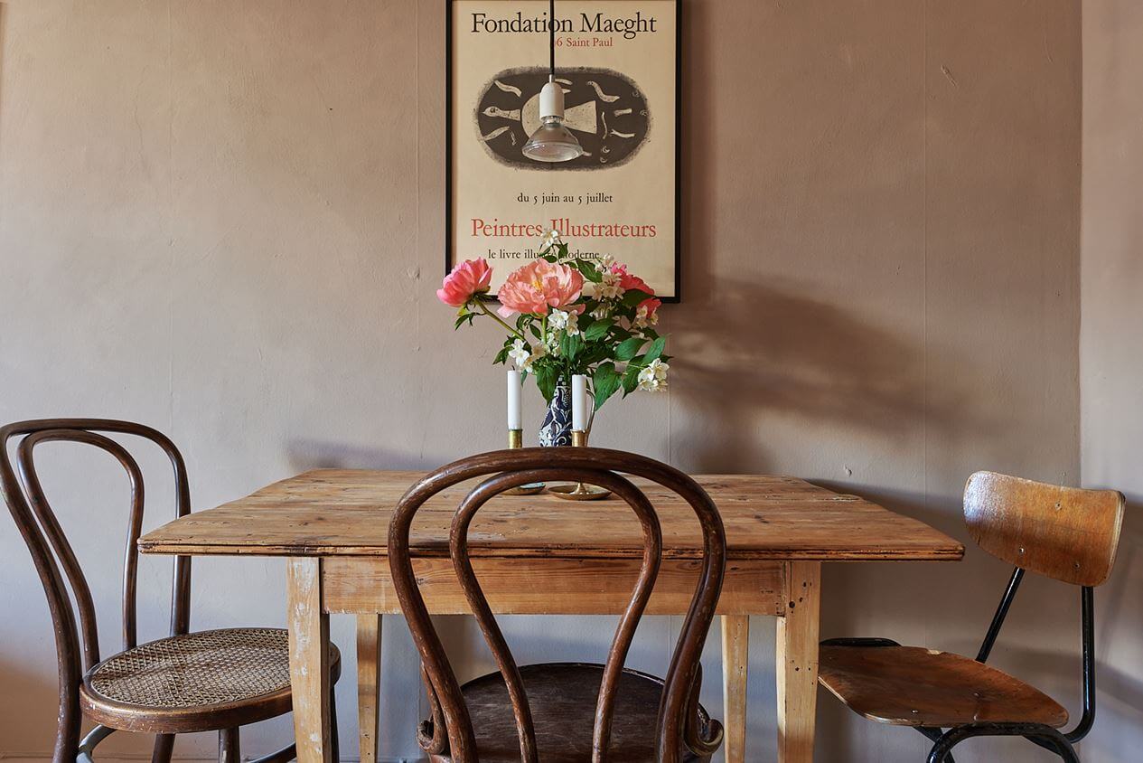 A Scandinavian Studio Apartment with Pink Walls 10 wooden-dining-table-studio