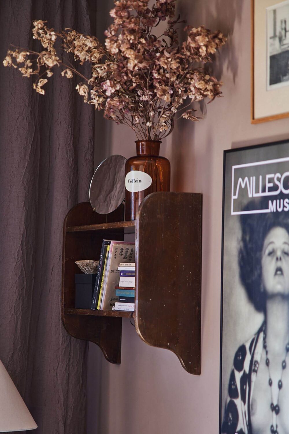 A Scandinavian Studio Apartment with Pink Walls 3 wooden-wall-shelf