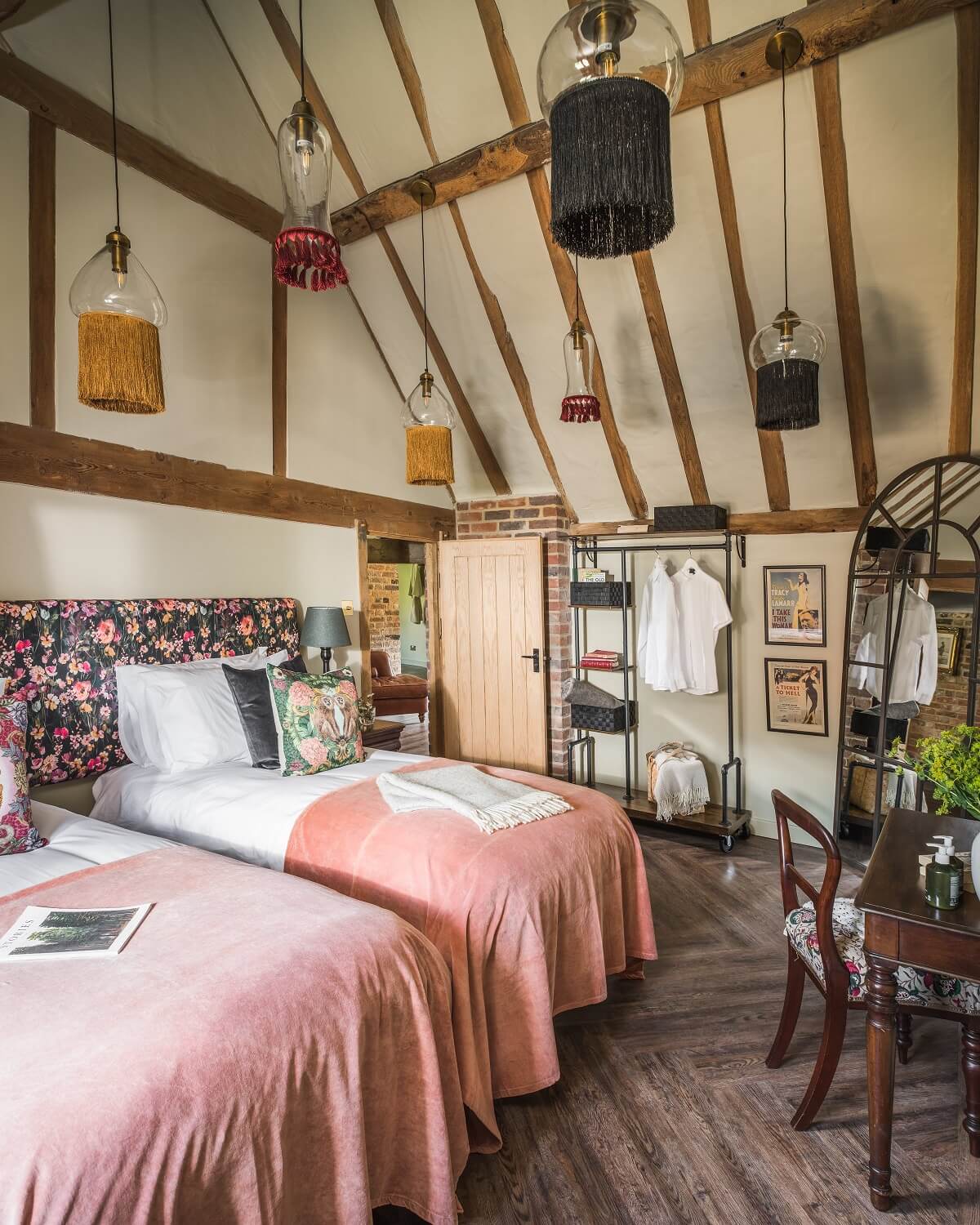 Great Budds Oast: A Cozy Holiday Home in the Kent Countryside 12 GREAT BUDDS OAST bedroom high pitched ceiling wooden beams