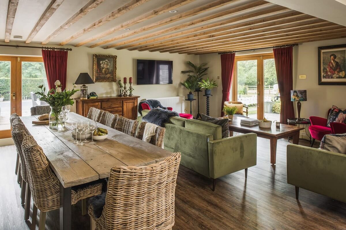 Great Budds Oast: A Cozy Holiday Home in the Kent Countryside 3 GREAT BUDDS OAST living room green sofas
