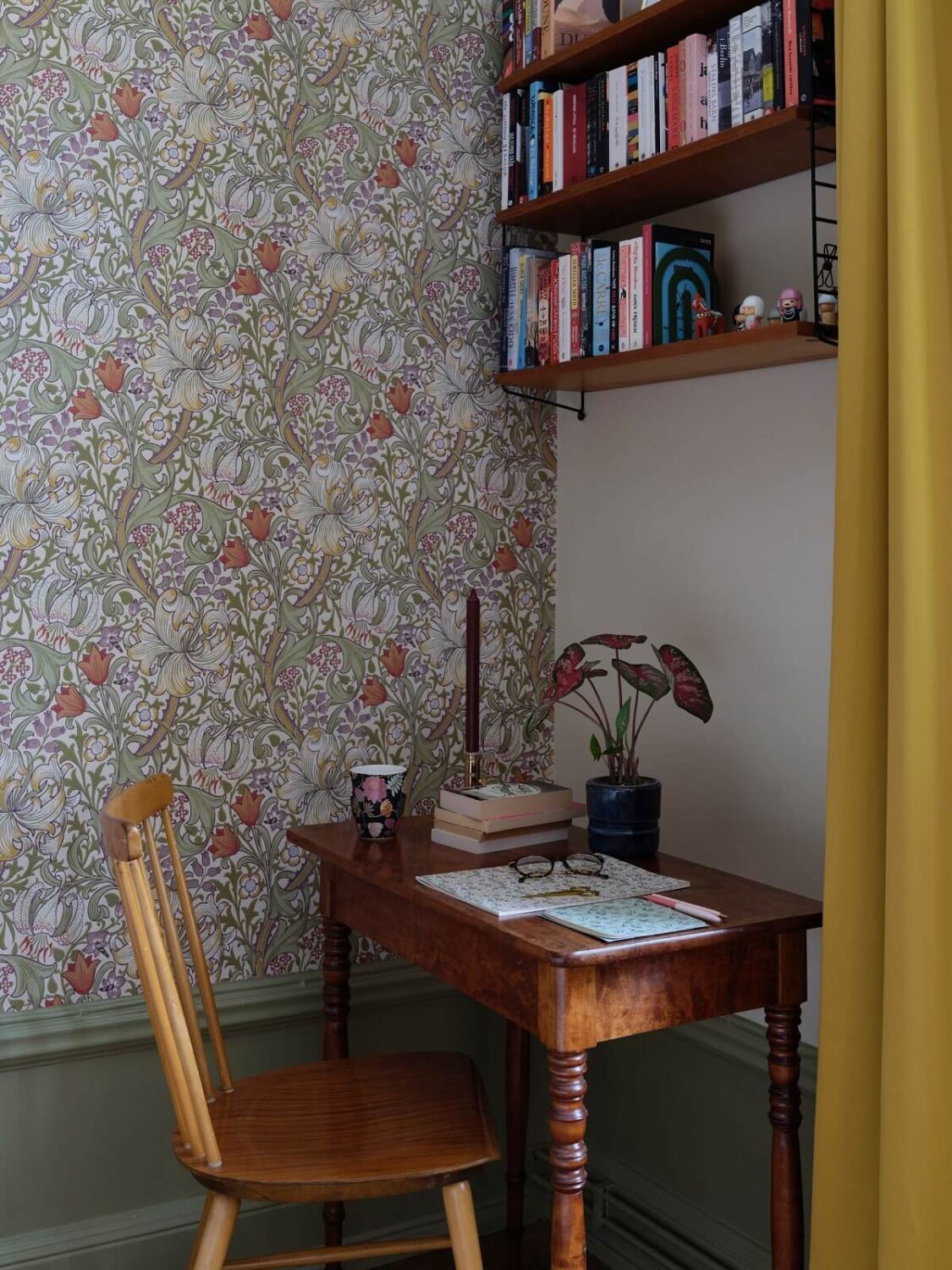 A Scandi Apartment Mixes Vintage with Contemporary Design 14 antique-wooden-desk-bookshelves-wallpaper-nordroom