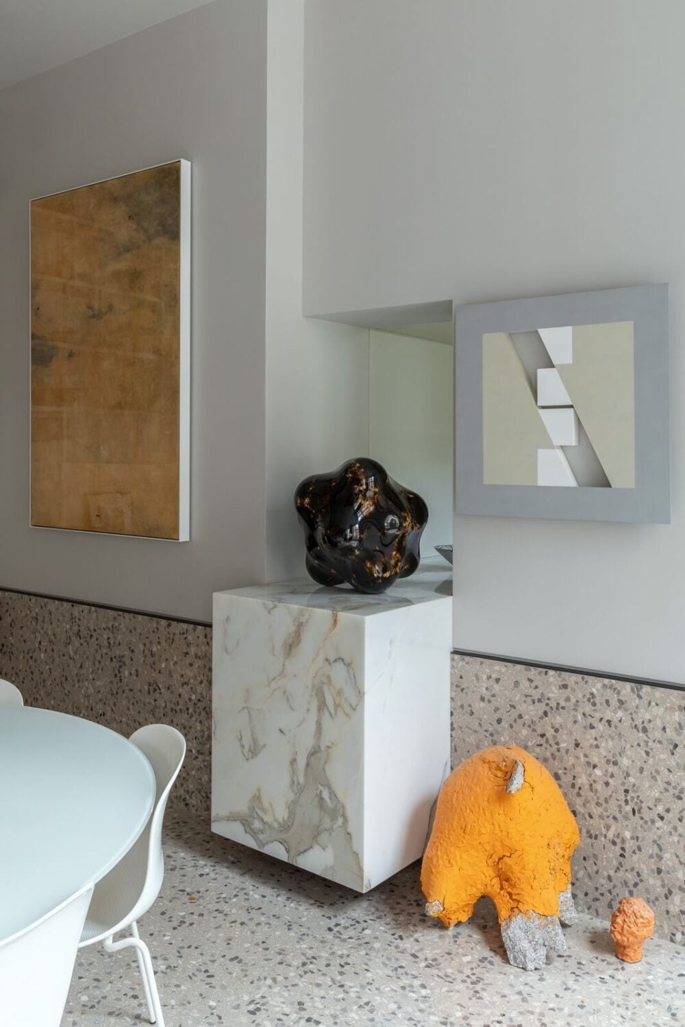 A Unique London Home with Terrazzo Tiles and a Roof Terrace 11 art work white dining room terrazzo tiles