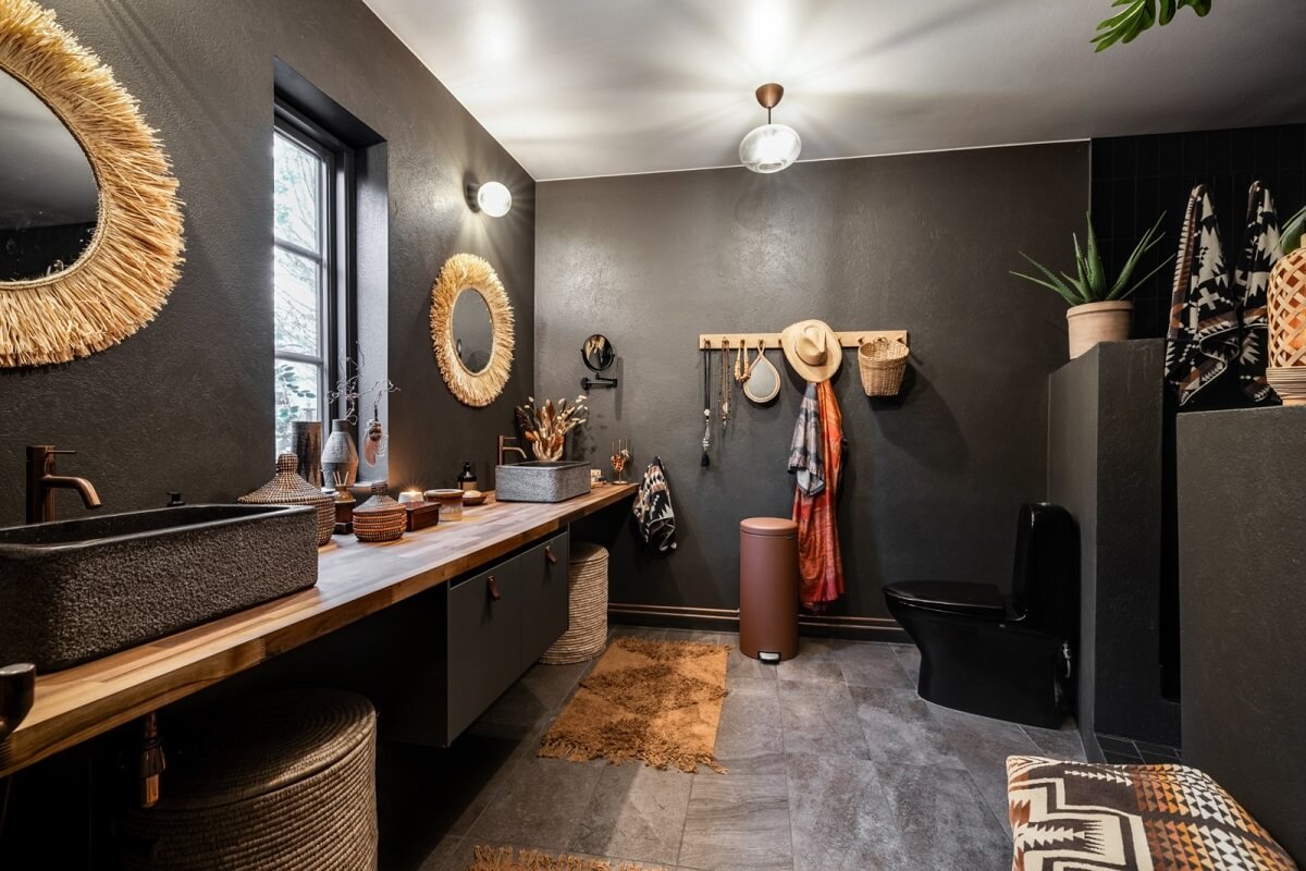 A Unique Bohemian Family Home in a Former Swedish Bakery 27 bathroom-black-walls-wooden-vanity-table-nordroom