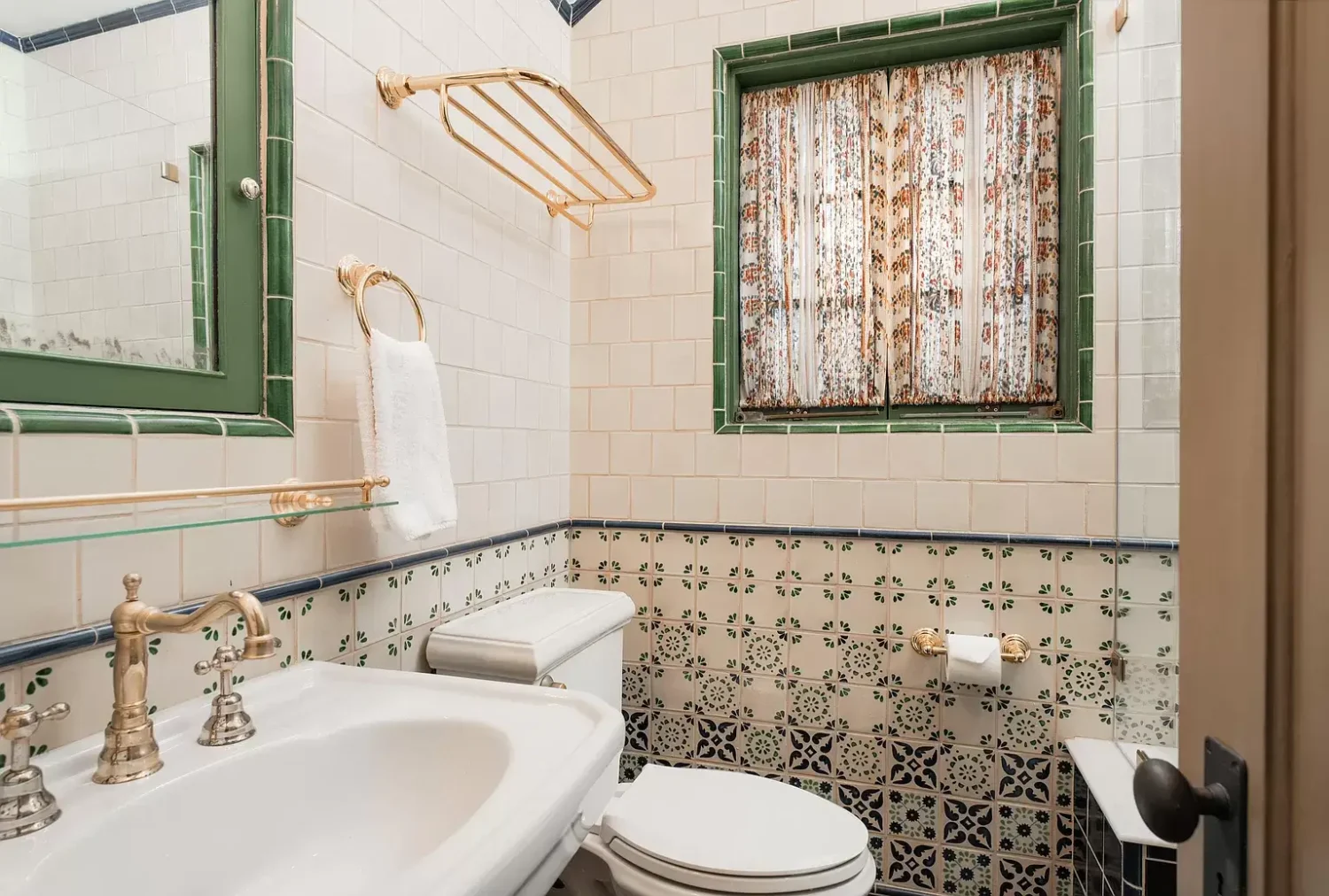 A Cozy Montecito Home Once Owned by Larry David 18 bathroom-blue-tiles