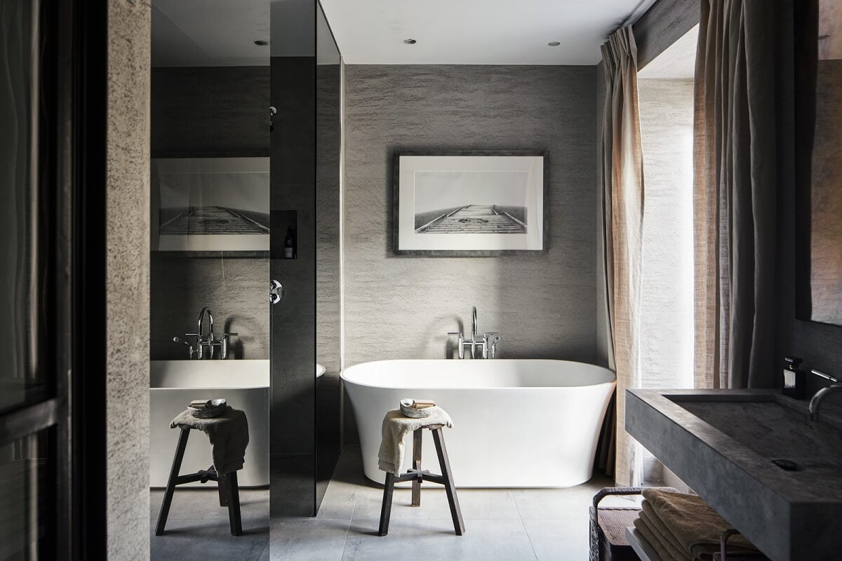 Stylish Monochrome Interiors in an Early 20th Century House 19 bathroom-gray-porcelain-tiles-plaster-walls-freestanding-bath-nordroom