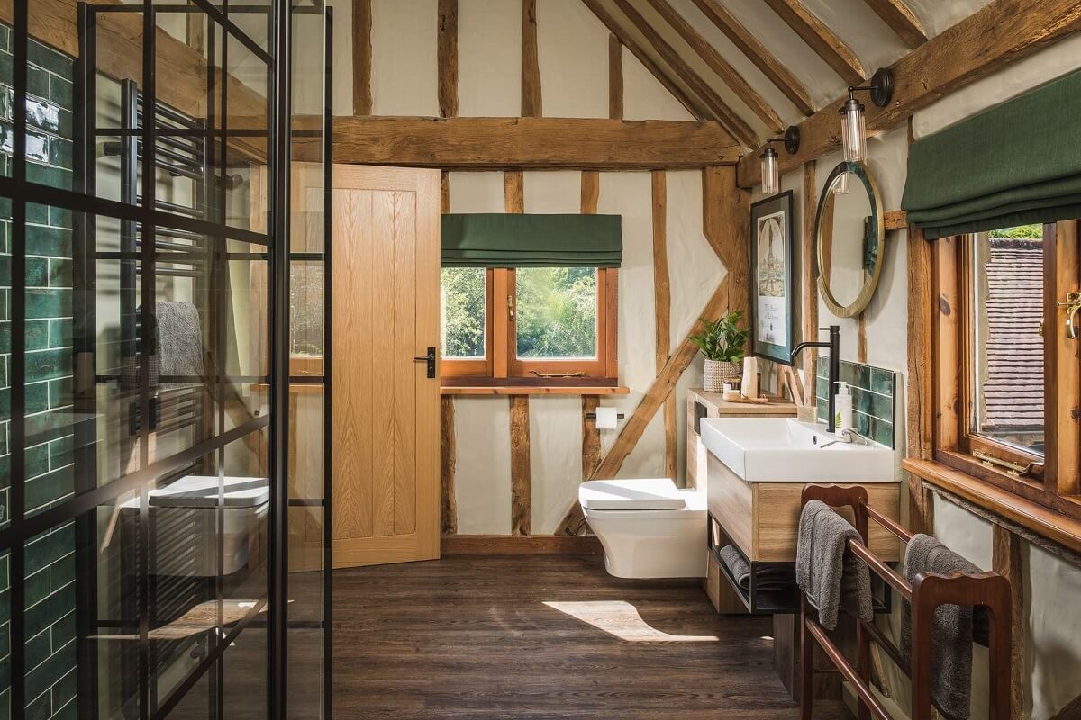 Great Budds Oast: A Cozy Holiday Home in the Kent Countryside 22 bathroom pitched ceiling wooden beams GREAT BUDDS OAST