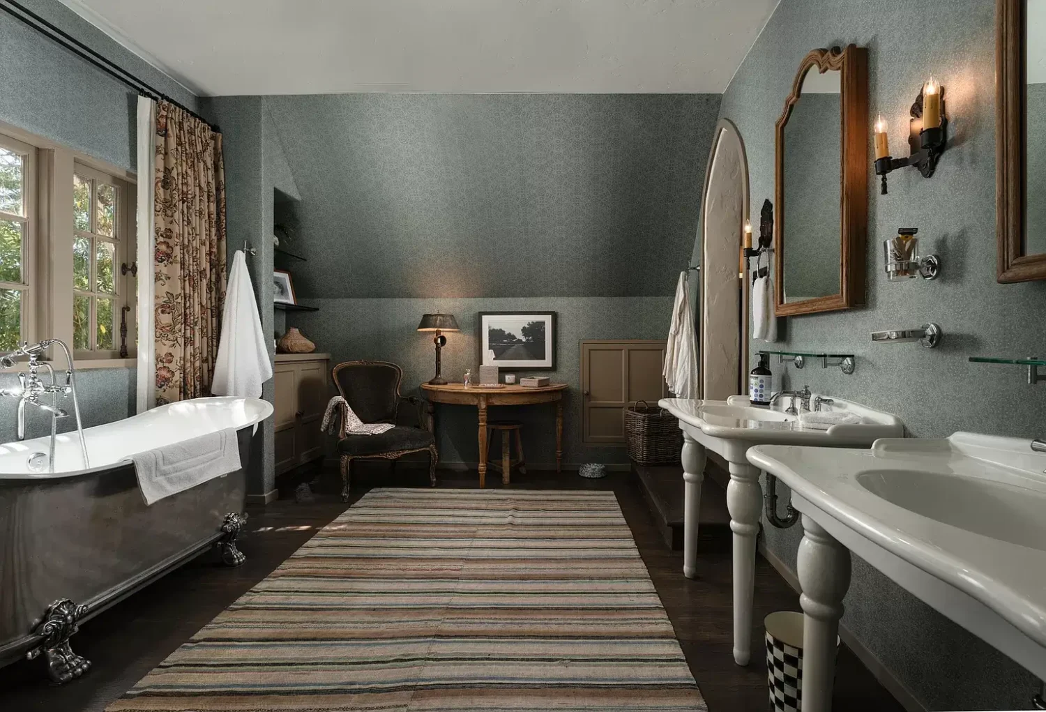 A Cozy Montecito Home Once Owned by Larry David 15 bathroom slanted blue walls freestanding bath