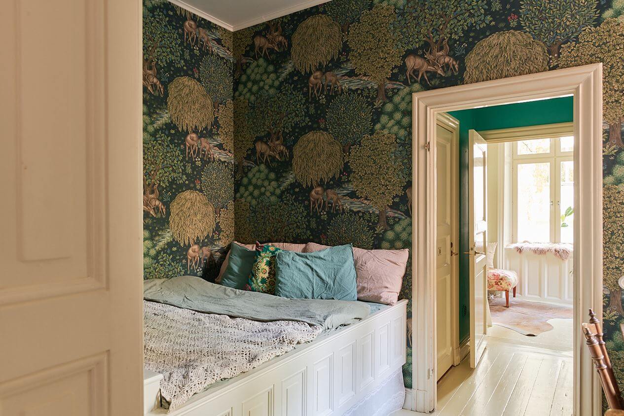 A Romantic Apartment with Original Details 13 bed-niche-green-wallpaper