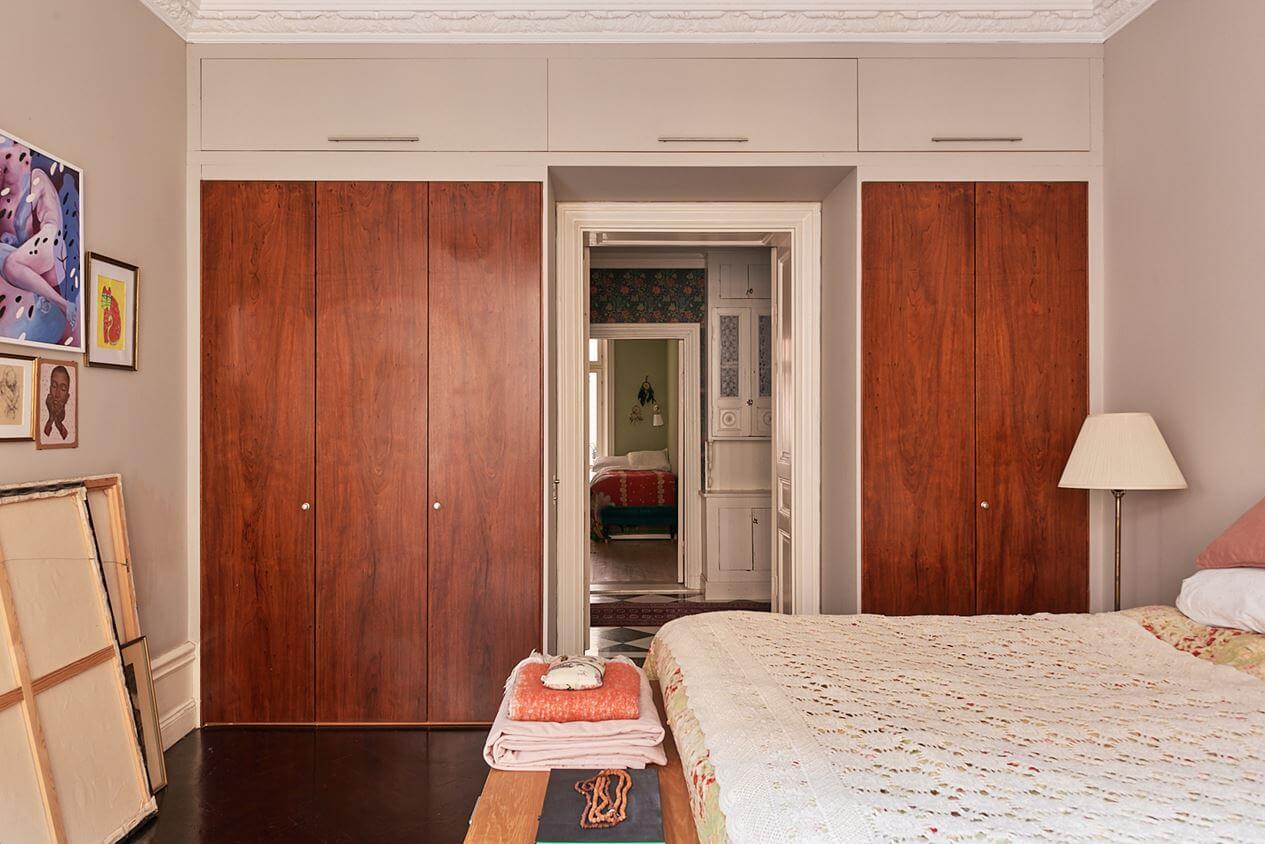 A Romantic Apartment with Original Details 31 bedroom-built-in-wardrobes-wooden-doors