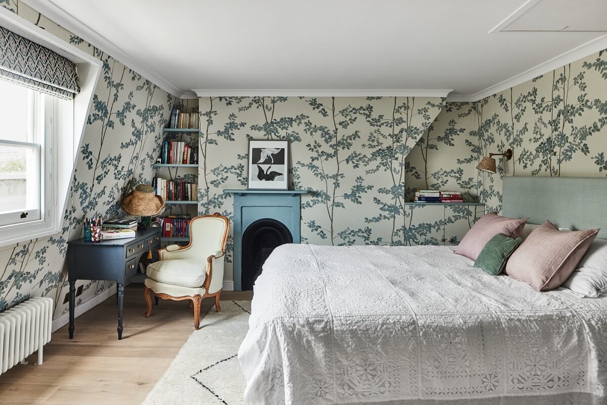 Blue Color Accents in a Restored London Townhouse 21 bedroom-slanted-ceiling-fireplace-desk-nordroom