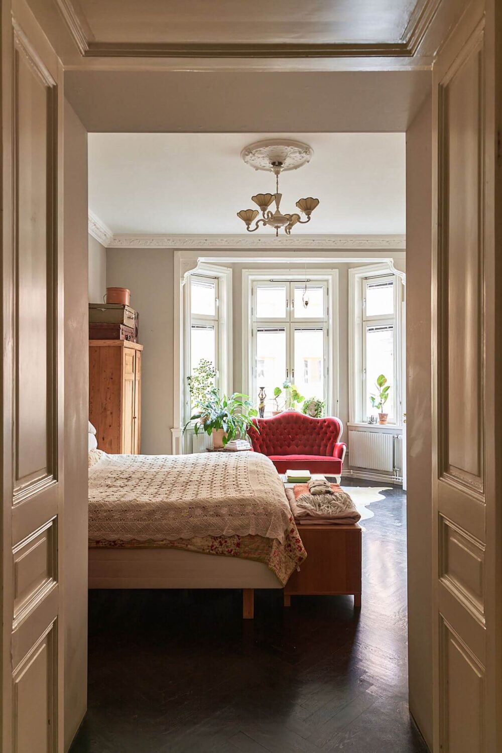 A Romantic Apartment with Original Details 32 bedroom-view-dark-wooden-floor