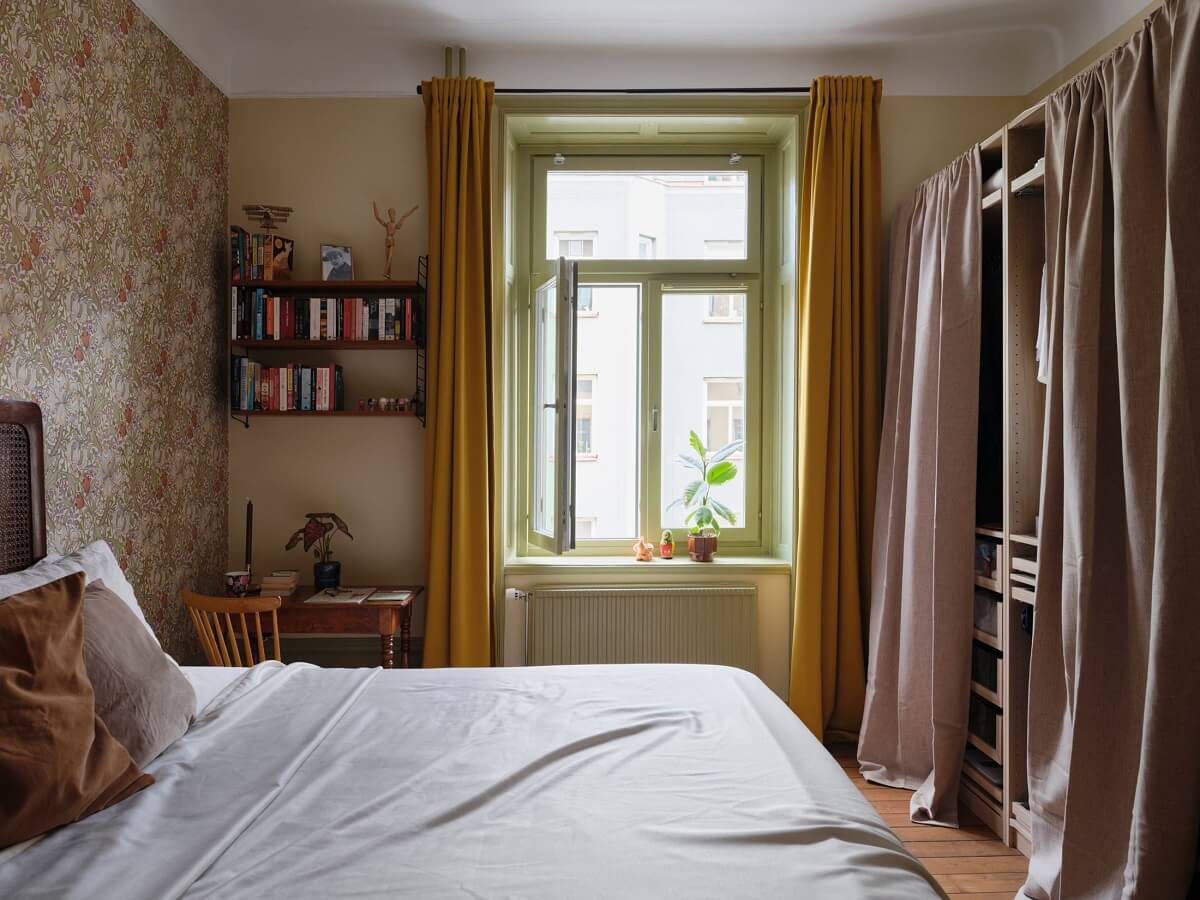 A Scandi Apartment Mixes Vintage with Contemporary Design 13 bedroom-wallpaper-desk-ochre-curtains-wardrobes-nordroom
