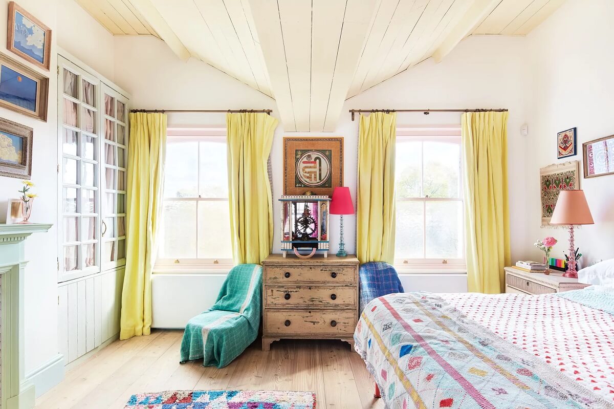 A Playful Colorful Eclectic Artist Home in London 22 bedroom yellow curtains