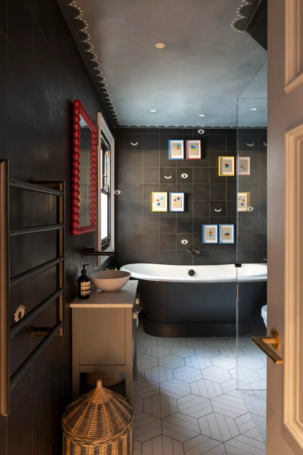 50+ Rooms That Prove ‘The Unexpected Red Theory’ Really Works 3 black-bathroom-freestanding-bath-nordroom