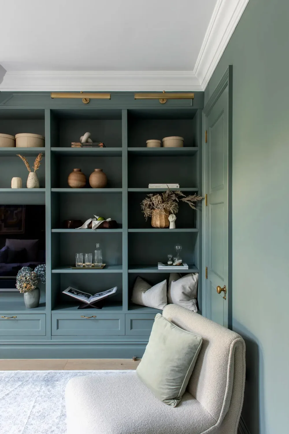 Muted Colors and Classic Design in a London Townhouse 7 blue-built-in-cabinets-living-room