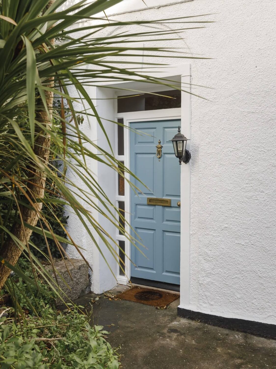 A Light Coastal Home in England 21 blue front door coastal home england