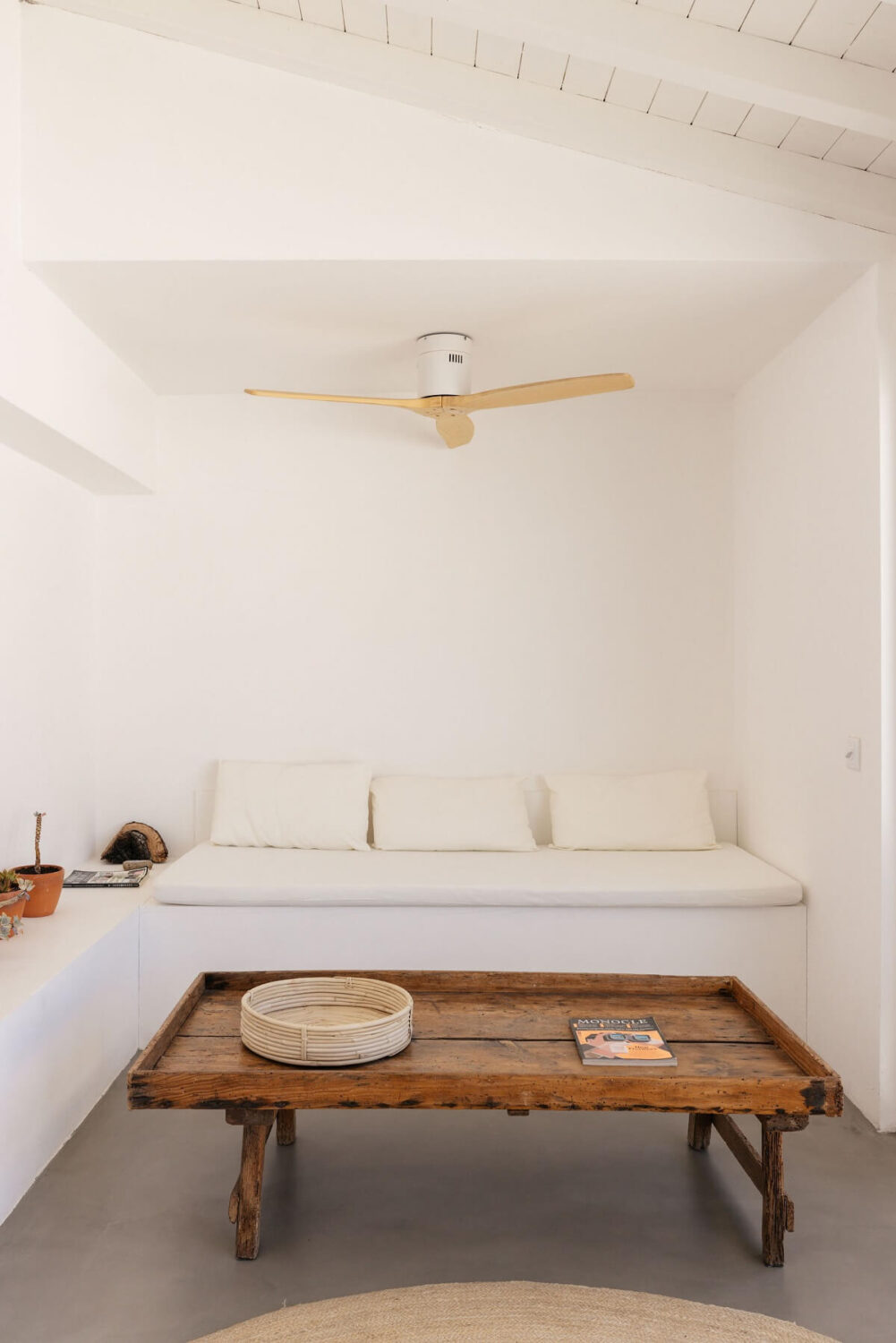 A Renovated 19th Century House with a Minimalistic Decor 3 built-in-seating-wooden-coffee-table