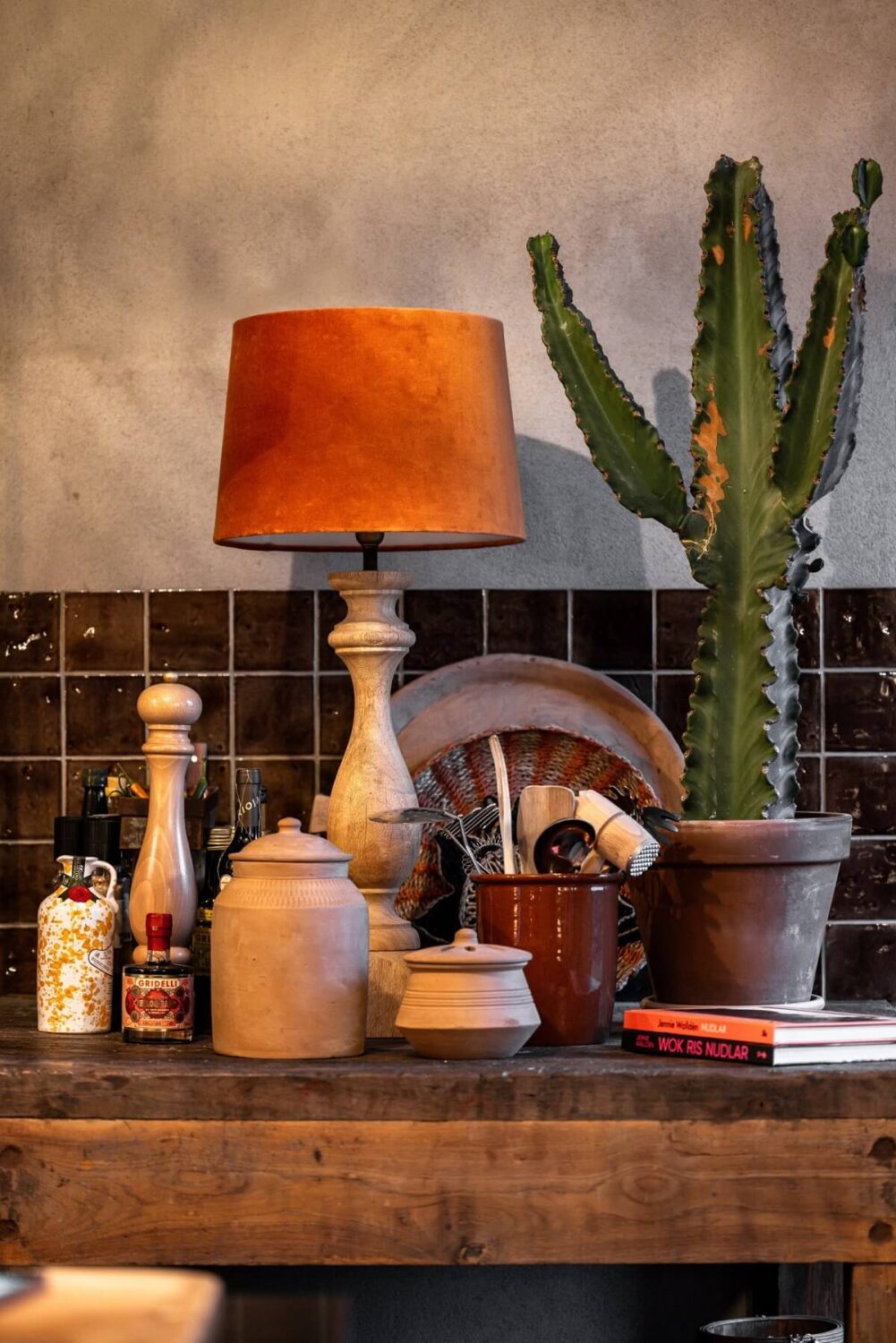 A Unique Bohemian Family Home in a Former Swedish Bakery 14 burgundy-kitchen-tiles-nordroom