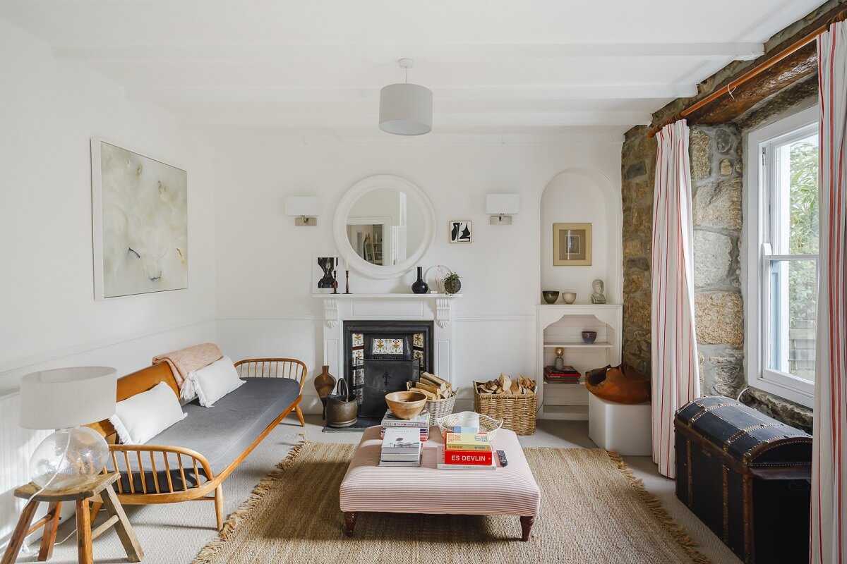 A Light Coastal Home in England 1 coastal living room stone accent wall