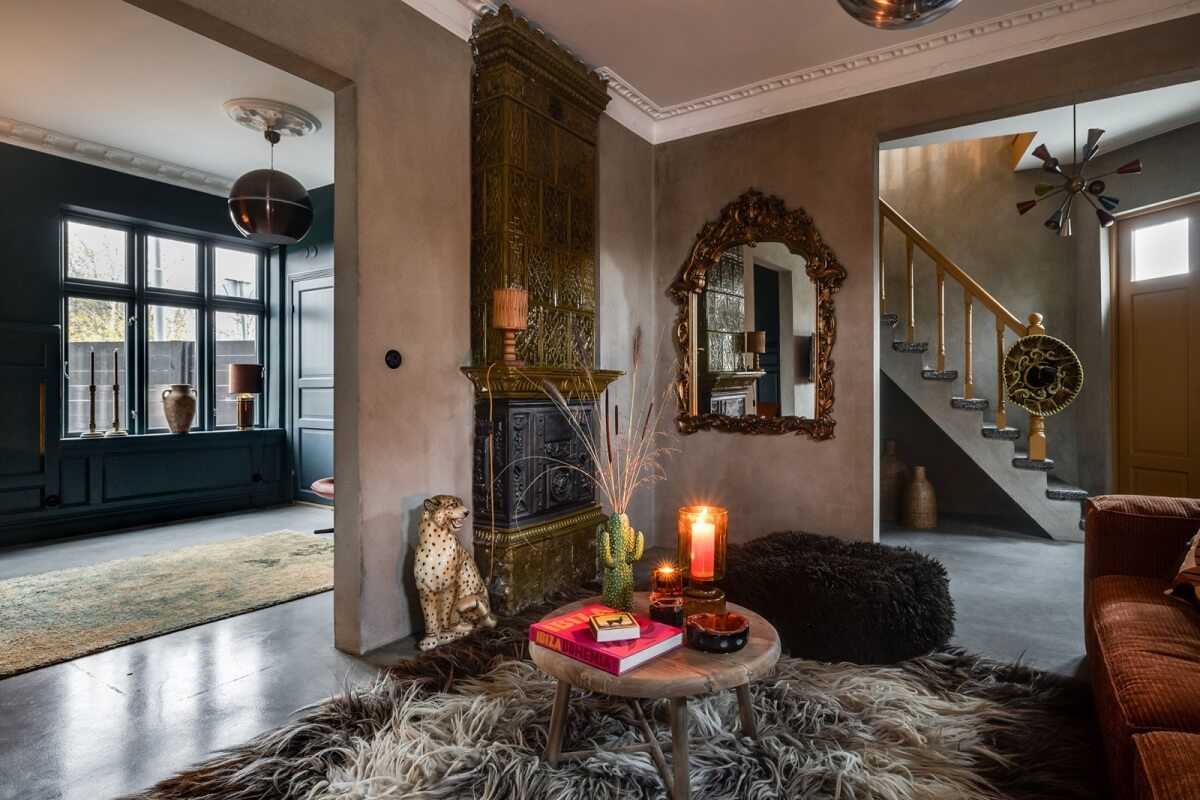 A Unique Bohemian Family Home in a Former Swedish Bakery 2 cozy-living-room-large-rug-fireplace-nordroom