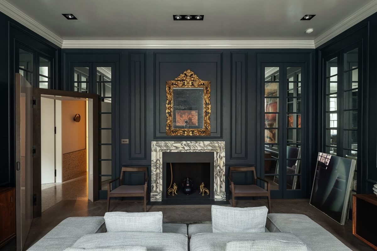 A Unique London Home with Terrazzo Tiles and a Roof Terrace 6 dark blue living room marble fireplace