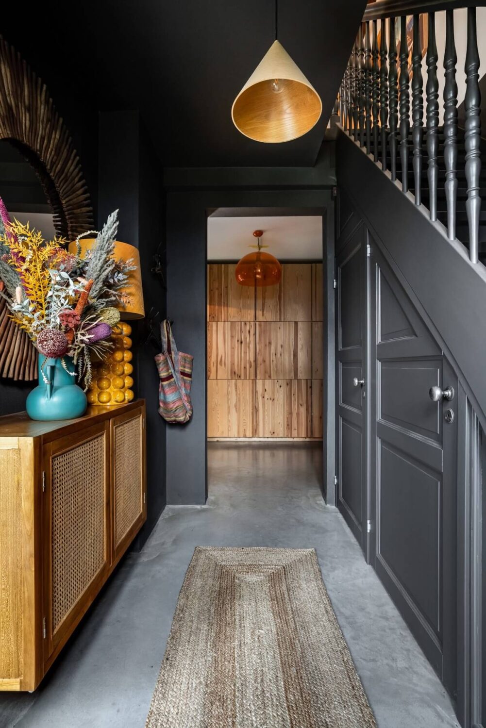 A Unique Bohemian Family Home in a Former Swedish Bakery 22 dark-gray-hallway-nordroom