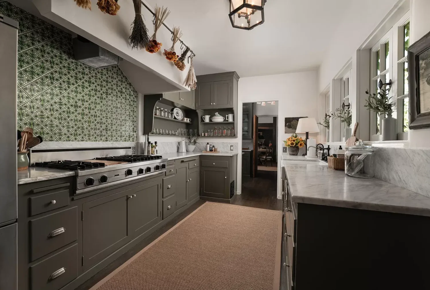 A Cozy Montecito Home Once Owned by Larry David 6 dark-gray-kitchen-green-tles