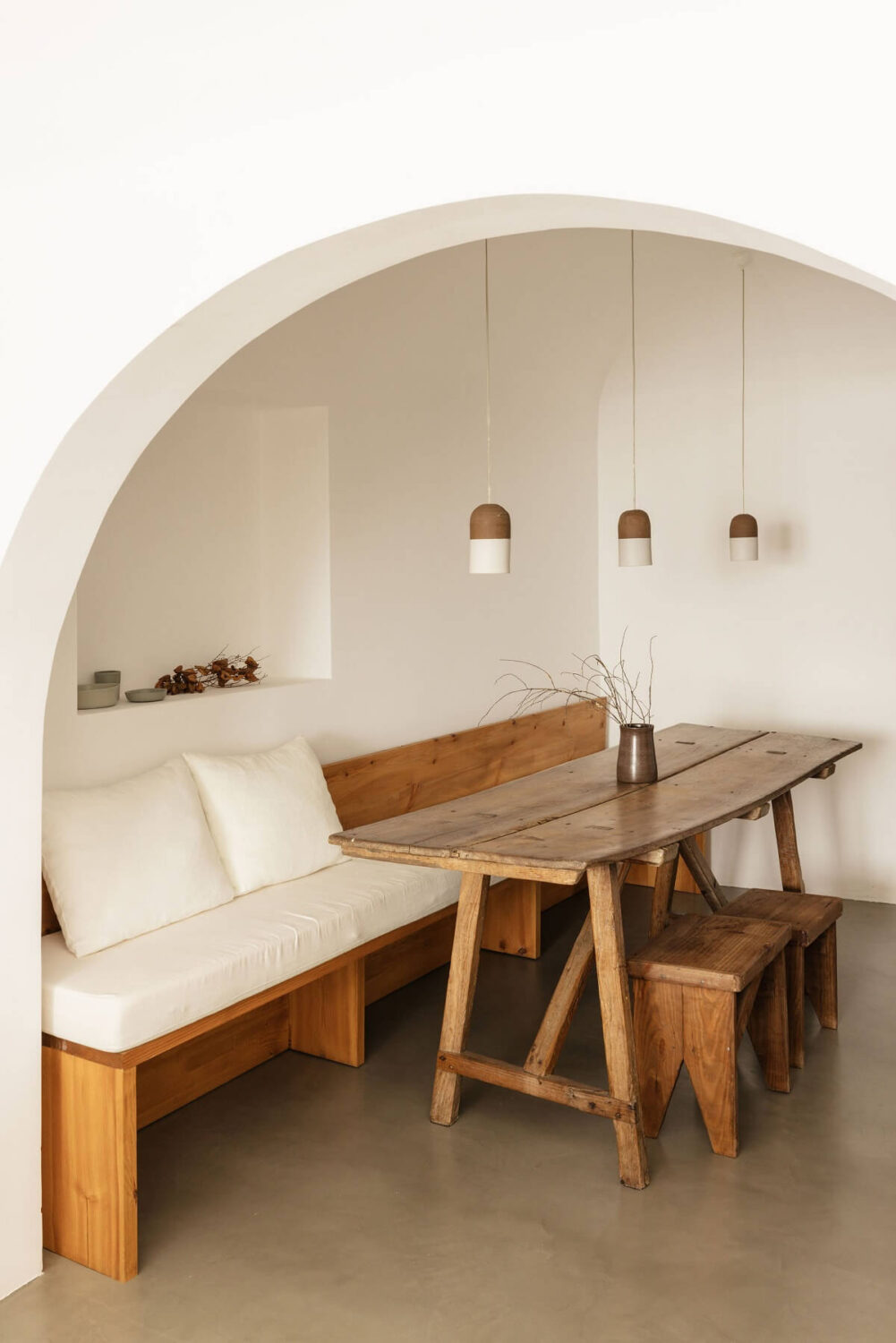 A Renovated 19th Century House with a Minimalistic Decor 5 dining-space-built-in-bench-wooden-table