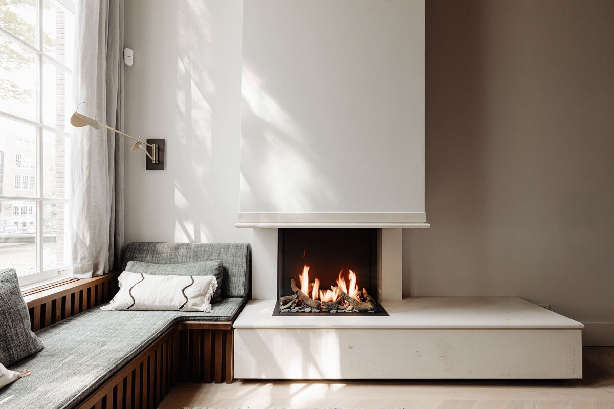 A Luxurious Amsterdam Canal House with High Ceilings 7 fireplace window seat