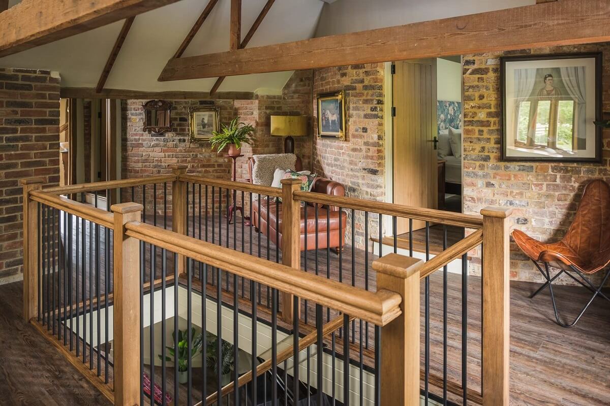 Great Budds Oast: A Cozy Holiday Home in the Kent Countryside 11 first floor landing exposed brick GREAT BUDDS OAST