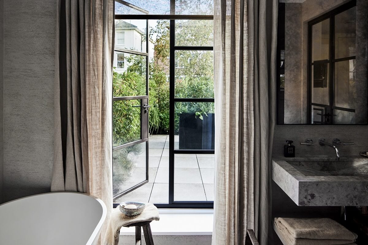 Stylish Monochrome Interiors in an Early 20th Century House 20 gray-bathroom-with-terrace-access-nordroom