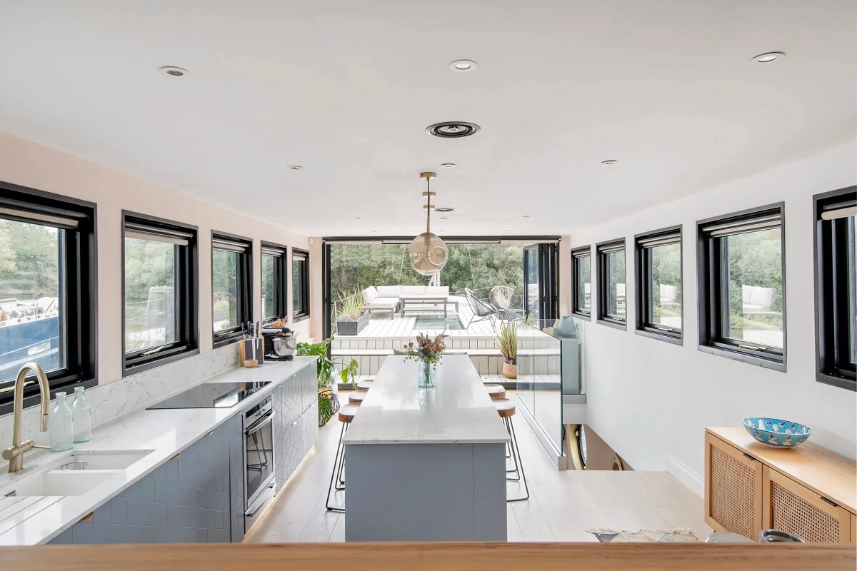 A Spacious and Stylish Houseboat in London 5 gray kitchen cabinets houseboat london nordroom