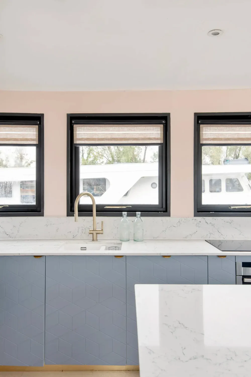 A Spacious and Stylish Houseboat in London 6 gray kitchen cabinets london houseboat nordroom