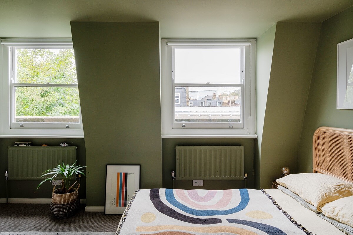 A Green and Pink London Townhouse with A Modern Extension 20 green-bedroom-slanted-ceiling-nordroom