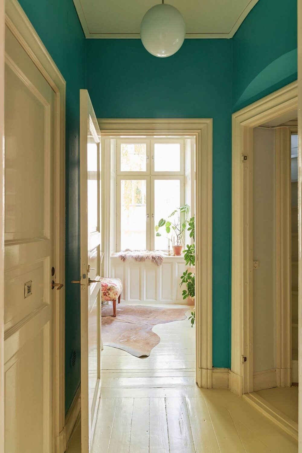 A Romantic Apartment with Original Details 33 green-hallway-historic-apartment-nordroom