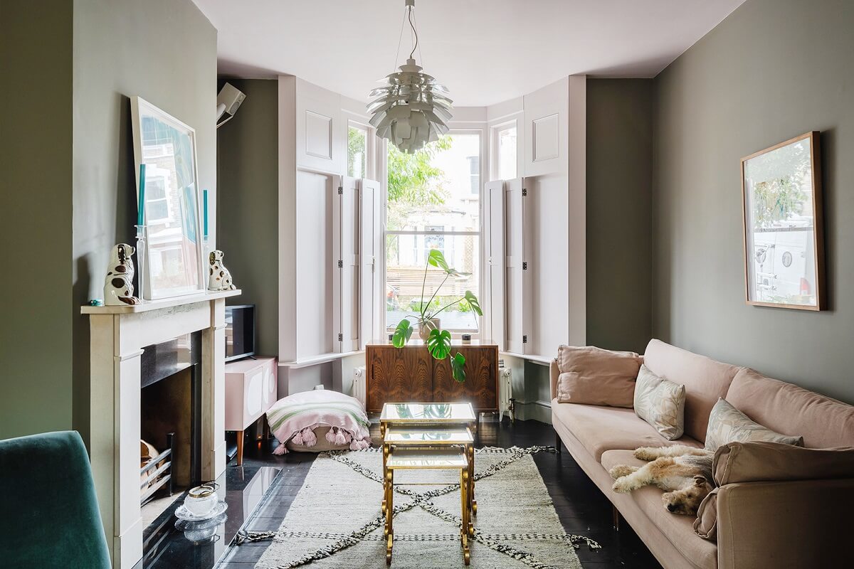 Valspar Color of the Year 2026: Warm Eucalyptus 13 green-living-room-fireplace-pink-sofa-nordroom