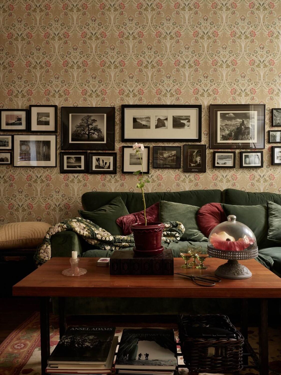 A Warm Vintage Apartment in Stockholm 4 green-sofa-wallpaper-vintage-living-room-nordroom