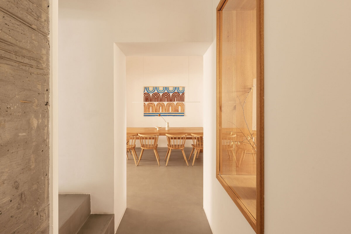 A Renovated 19th Century House with a Minimalistic Decor 6 hallway-concrete-feature-wall