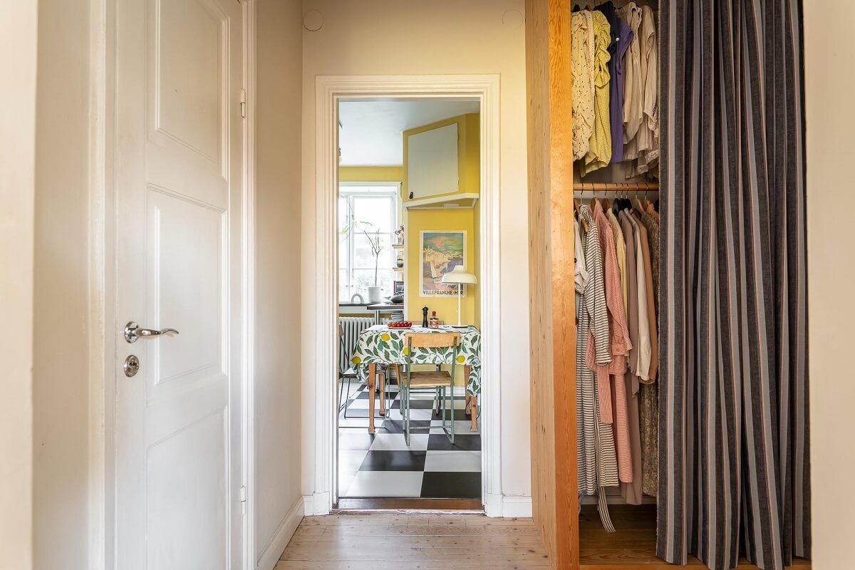 Colorful Decor in a Scandinavian Apartment 18 hallway-wardrobe-curtain-nordroom