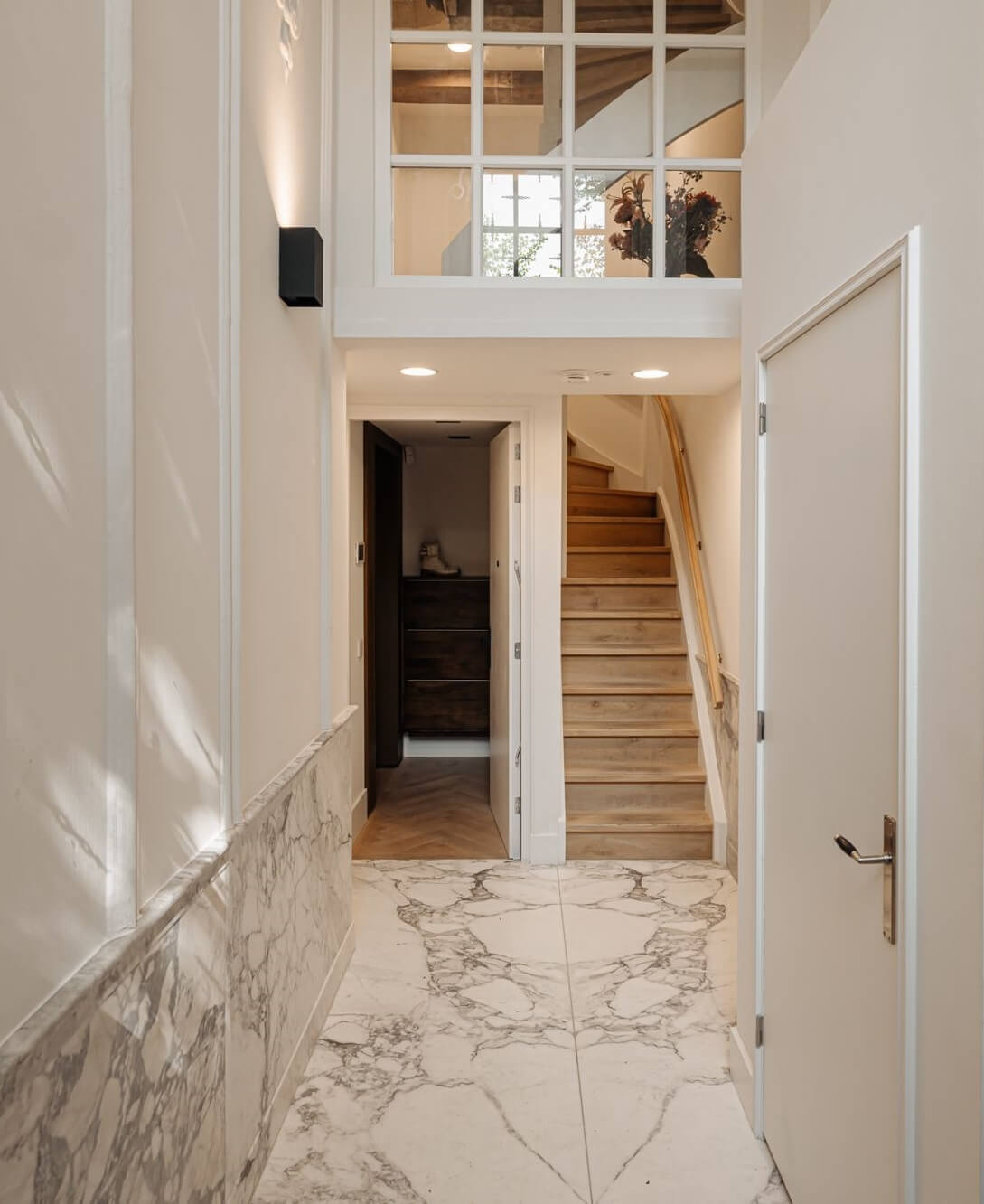 A Luxurious Amsterdam Canal House with High Ceilings 22 hallway with marble floor